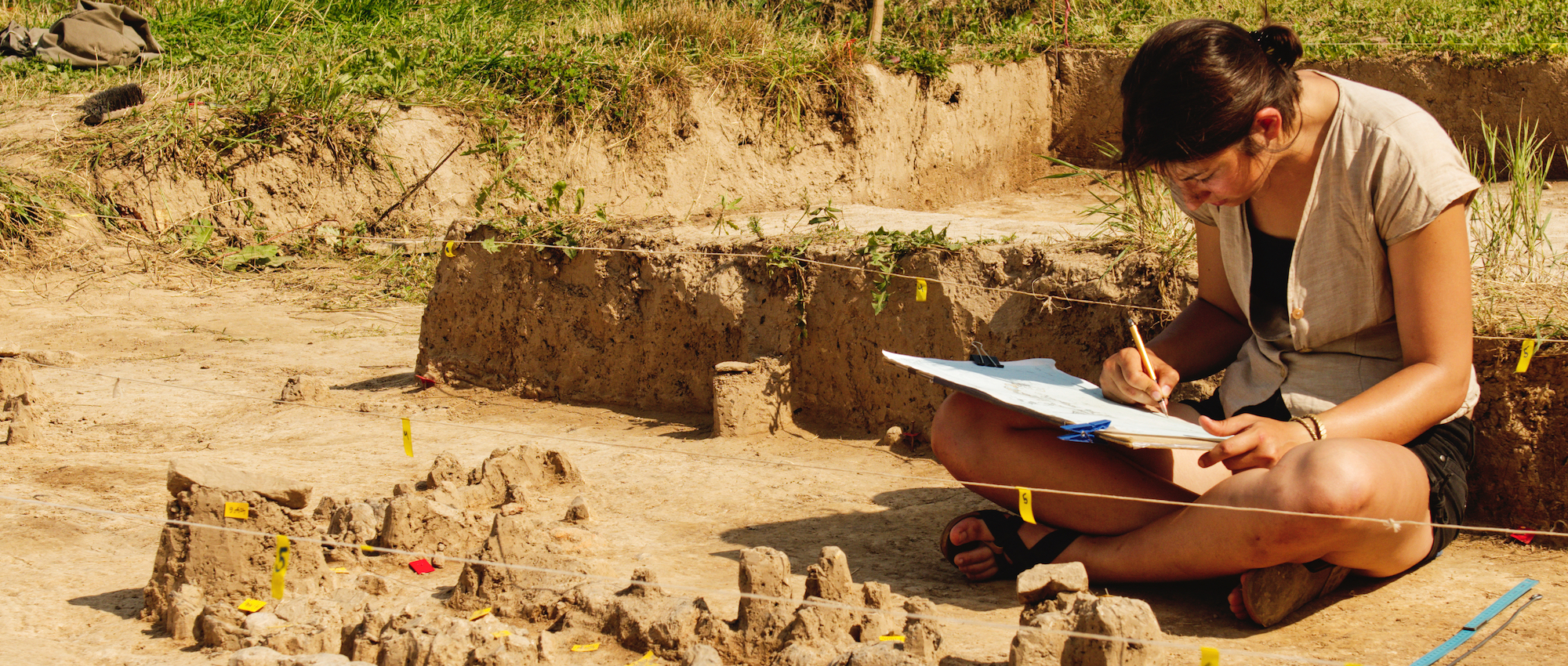 Archeological tools, Archeologist working on site, hand and tool.